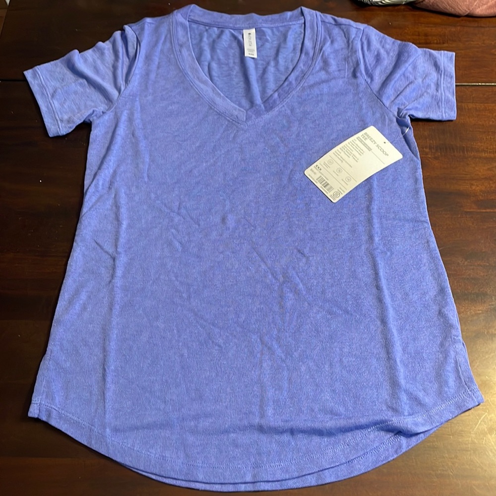 Athleta T-shirt. XXS. Brand new. Color: Periwinkle.